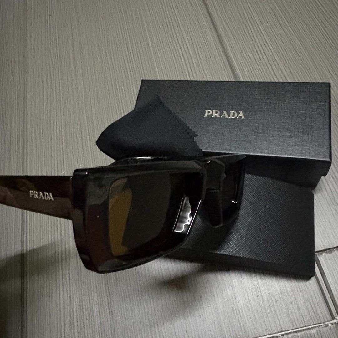 Prada brown sunglasses (Category: Sunglasses & Eyewear) located in Cavite. Submitted by spotthisthrift (Listing ID 1464730906, Image 2). Description: .