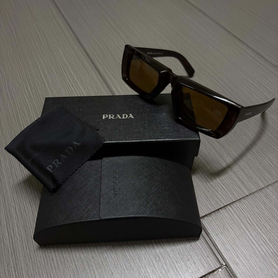 Prada brown sunglasses (Category: Sunglasses & Eyewear) located in Cavite. Submitted by spotthisthrift (Listing ID 1464730906, Image 1). Description: .