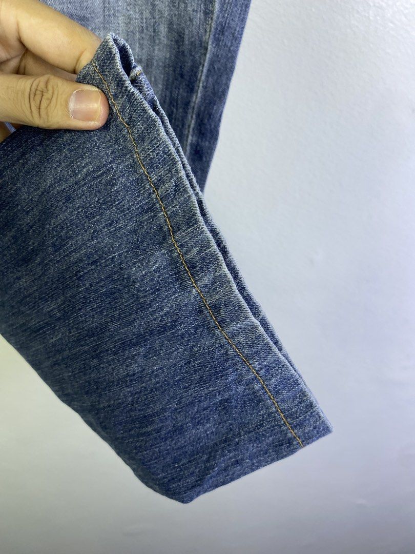 PRADA LUNA ROSSA Denim Jeans (Category: Jeans) located in Manila. Submitted by declutterpromax (Listing ID 1464620668, Image 3). Description: - PRADA LUNA ROSSA blue denim jeans - Classic straight leg fit - Distressed wash for a cool vintage vibe - Secure button and zip fly closure - Functional 5-pocket design (2 back, 2 front) - Ideal for casual everyday wear - Check label for care instructions.