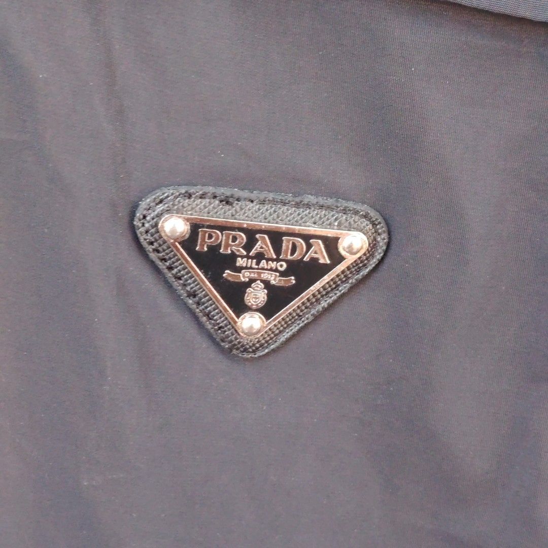 Prada Luna Rossa Pirelli Team Sweatshirt (Category: Coats, Jackets and Outerwear) located in Manila. Submitted by maetots (Listing ID 1464586787, Image 2). Description: - Authentic Prada sweatshirt - Size: XL - Features Luna Rossa Pirelli Team logo on chest pocket - Includes Prada Milano tag inside - Ideal for casual wear.