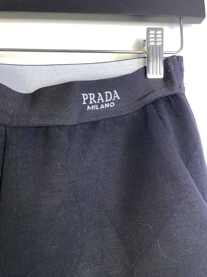 Prada Milano Black Jogger Pants (Category: Joggers) located in Manila. Submitted by declutterpromax (Listing ID 1464601126, Image 2). Description: - Prada Milano Jogger Pants - Color: Black - Size: M - Features elastic waistband with Prada Milano logo - Made in Italy - Perfect for comfortable and stylish casual wear.
