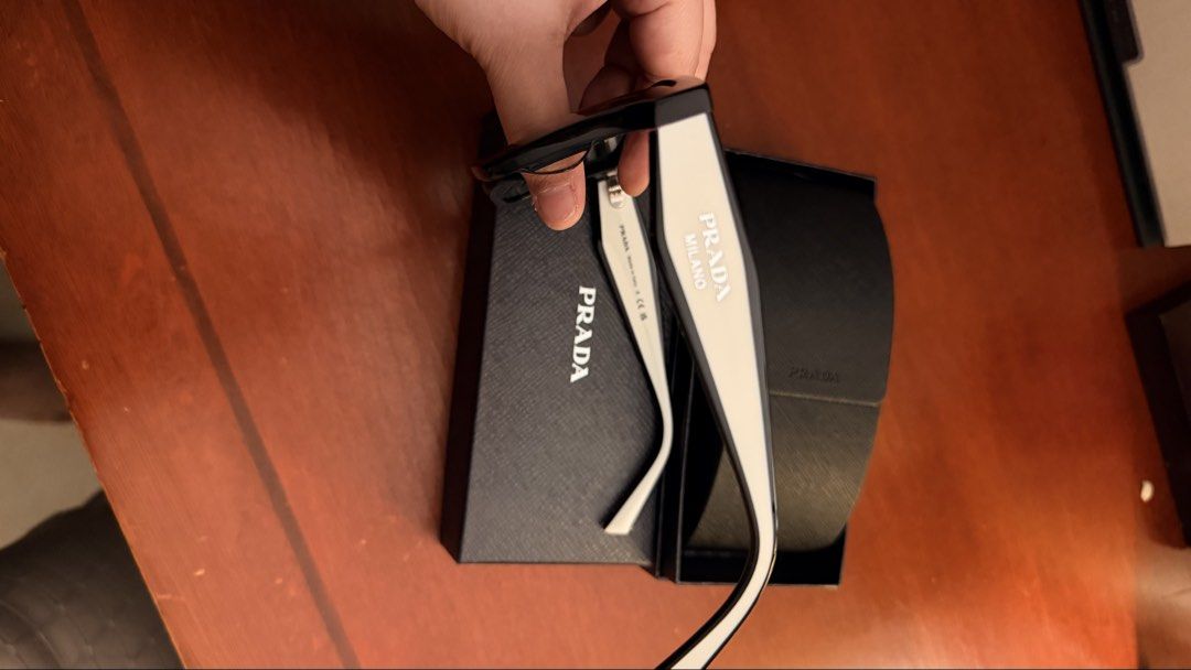 Prada Shades (Category: Luxury Accessories) located in Rizal. Submitted by mlouise22 (Listing ID 1464673740, Image 2). Description: Complete with Box, Case, and Cards.