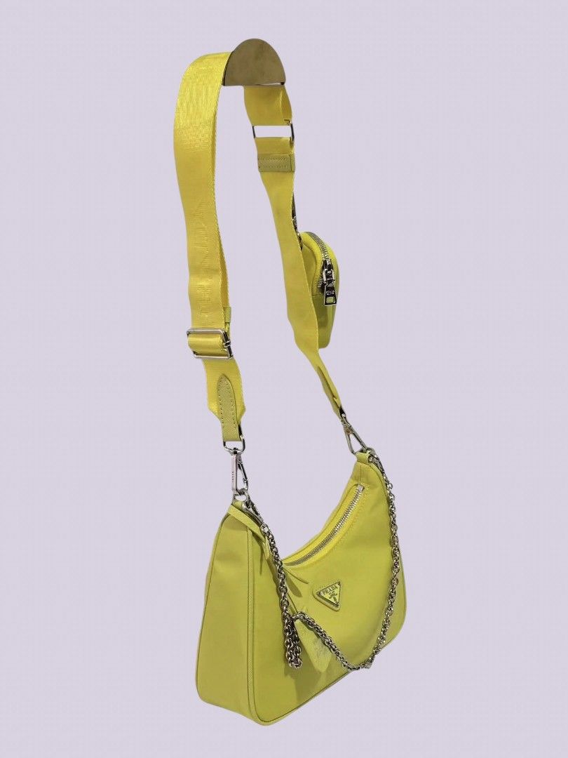 Prådå multipochet (Category: Luxury Bags & Wallets) located in Caloocan City. Submitted by love.purse (Listing ID 1464622234, Image 3). Description: - N.G.A. - from 🇯🇵 ukay - used Prådå multïpochet sling bag - detachable small pouch and adjustable long strap - comes with dust bag.