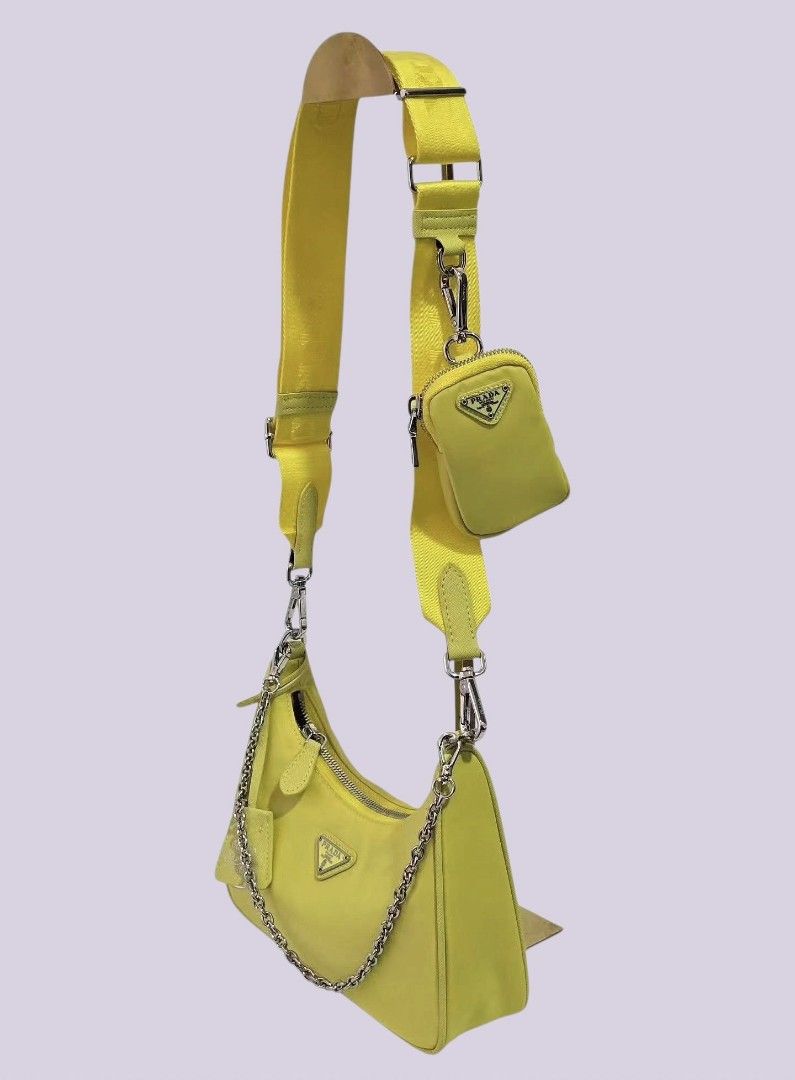 Prådå multipochet (Category: Luxury Bags & Wallets) located in Caloocan City. Submitted by love.purse (Listing ID 1464622234, Image 2). Description: - N.G.A. - from 🇯🇵 ukay - used Prådå multïpochet sling bag - detachable small pouch and adjustable long strap - comes with dust bag.