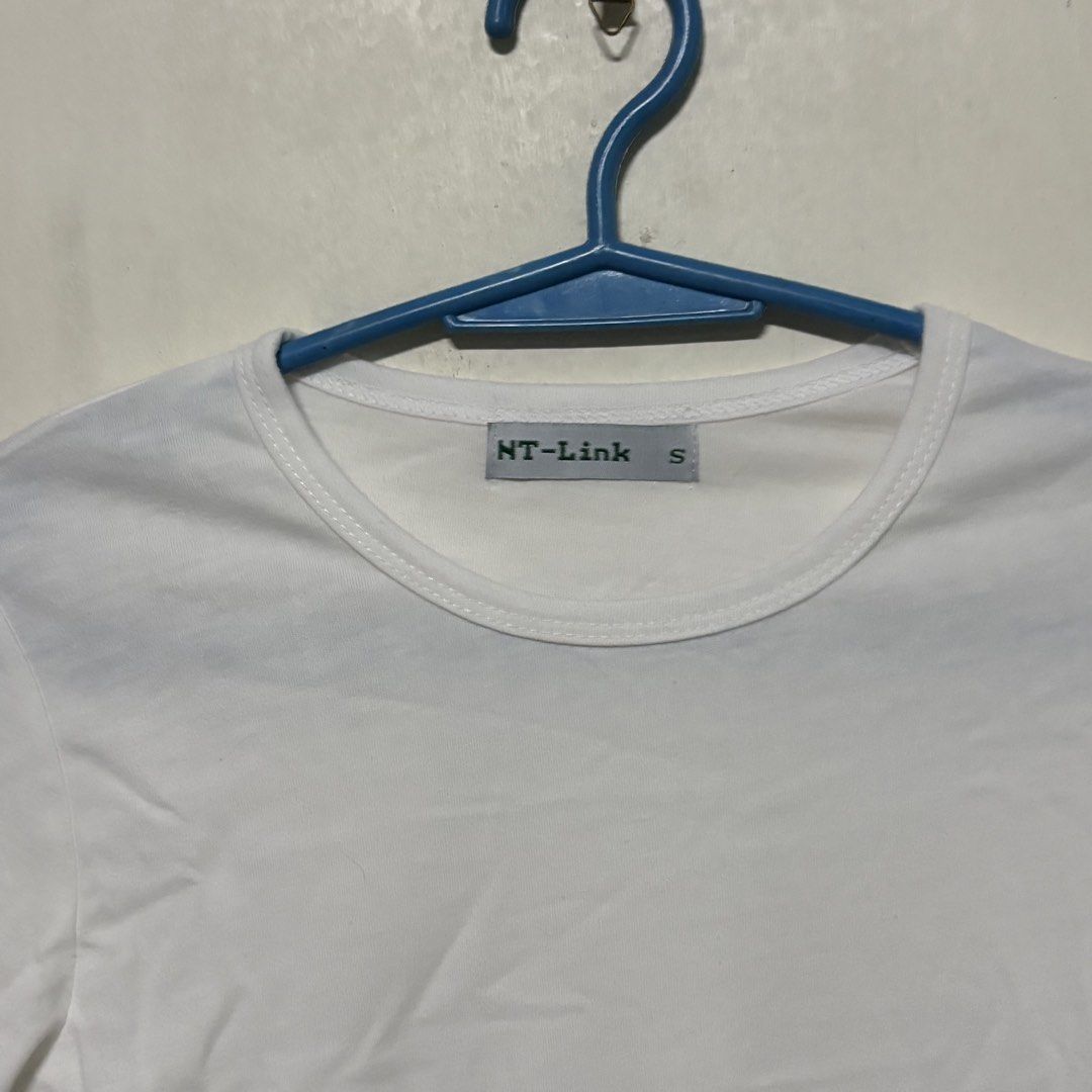 Preloved NT-Link White Long Sleeved Shirt (Category: Longsleeves) located in Manila. Submitted by zzajmr (Listing ID 1464664940, Image 2). Description: - Brand: NT-Link - Color: White - Style: Long-sleeved shirt - Size: S - Features: Simple, versatile, great for layering or wearing on its own. - Condition: Please check photos for details. best fit small to medium.