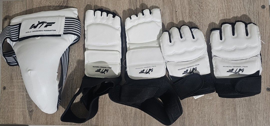 ​Pre-Loved Shift Taekwondo Complete Sparring Gear Set (With Bag) (Category: Combat Sports) located in Quezon City. Submitted by newgem.b5485b (Listing ID 1464745913, Image 3). Description: - ​Shift Reversible Body Armor / Chest Protector (Chest Guard): Size 2 - ​Shift Blue Head Guard with Clear Face Shield: Medium - ​Shift Forearm Guards (1 Pair): Medium - ​Shift Shin Guards (1 Pair): Medium - ​Hand Gloves / Gloves: Size 4 / Medium - ​Foot Guards