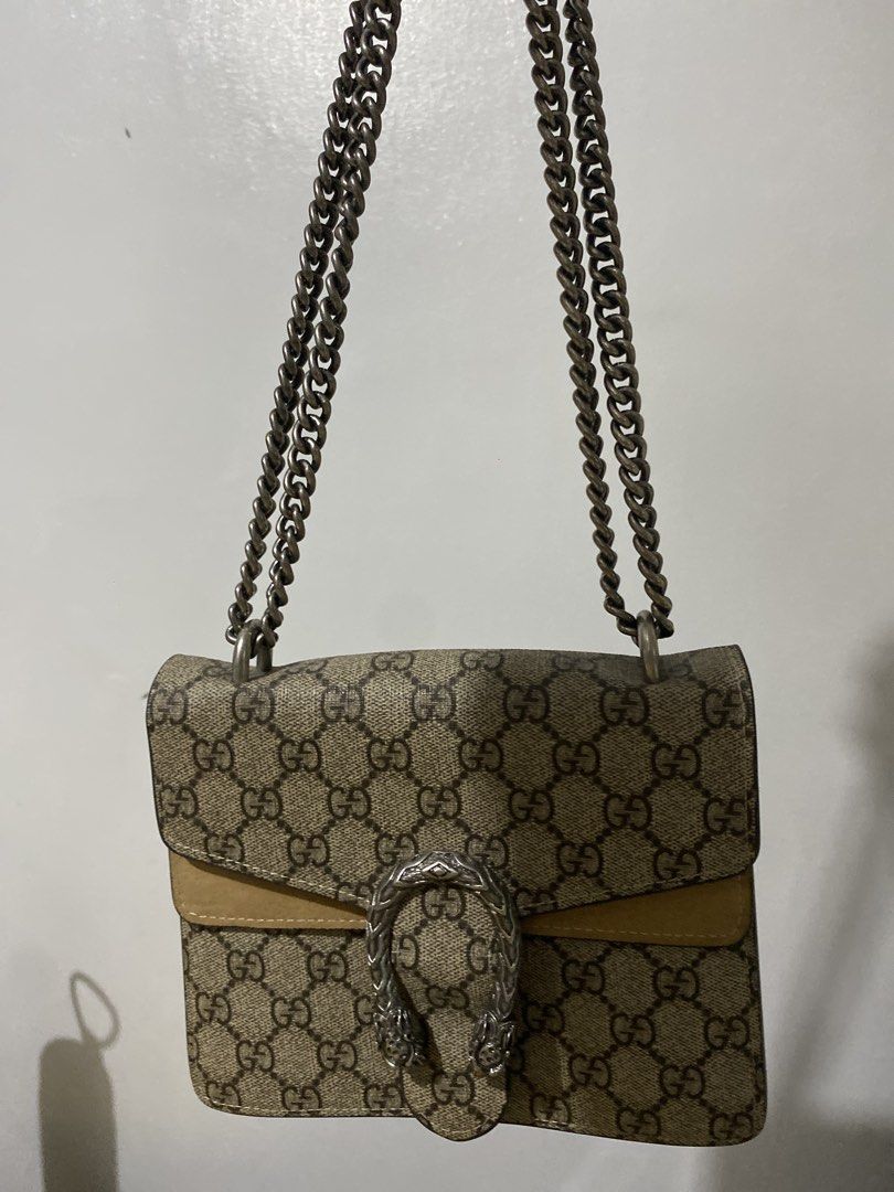 Preloved Textured Shoulder Bag with Chain Strap - As Is (Category: Shoulder Bags) located in Quezon City. Submitted by luvkobagsnshoes (Listing ID 1464580736, Image 2). Description: Selling a preloved textured canvas shoulder bag featuring a silver-tone chain strap and front flap hardware.Condition: Well-used, as-is condition. Needs a bit of exterior cleanup and interior restoration.Details: Perfect project bag for restoration or casual everyday 