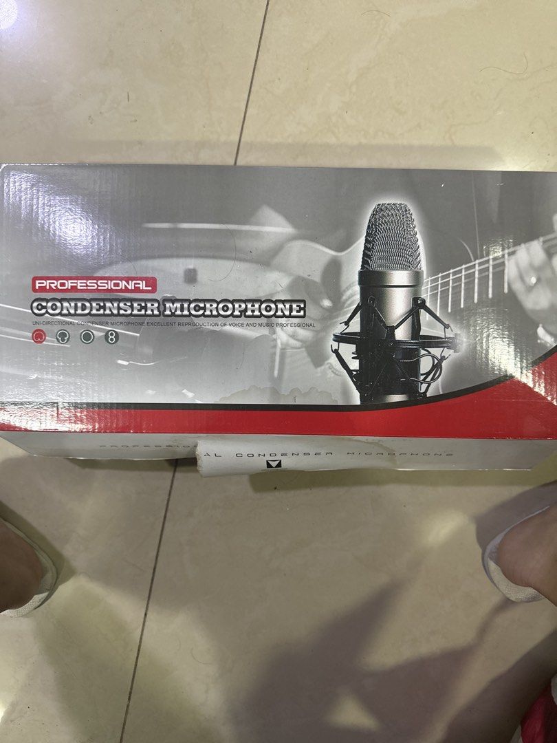 Professional Condenser Microphone with Accessories (Category: Microphones) located in Manila. Submitted by martyjoash94904 (Listing ID 1464616457, Image 1). Description: - Professional condenser microphone set - Perfect for voice and music recording - Includes: microphone, shock mount, pop filter, and cables - Everything is in the original box - Ready for your next recording project.