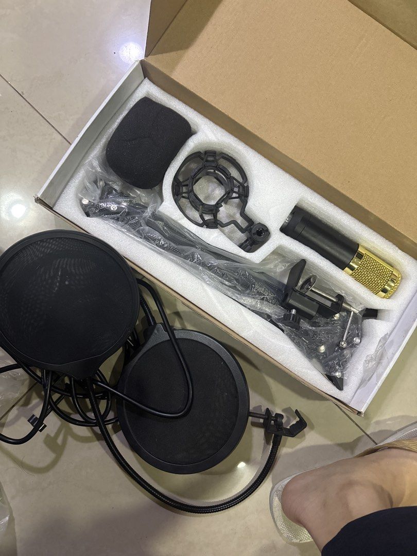 Professional Condenser Microphone with Accessories (Category: Microphones) located in Manila. Submitted by martyjoash94904 (Listing ID 1464616457, Image 3). Description: - Professional condenser microphone set - Perfect for voice and music recording - Includes: microphone, shock mount, pop filter, and cables - Everything is in the original box - Ready for your next recording project.