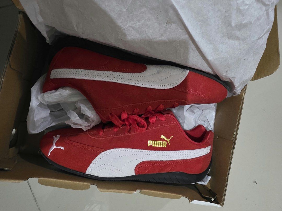 Puma Speed Cat OG Red White Shoes (Category: Sneakers) located in Manila. Submitted by wanderiri (Listing ID 1464631229, Image 3). Description: - Red Puma Speed Cat OG shoes used once - Classic white stripe detail on the side - Gold Puma logo accents on side and heel - Comes with original box - Size: UK 6 / US 7 / EUR 39 / CM 25.
