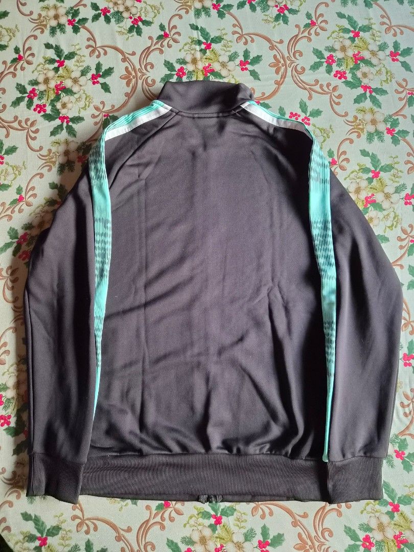 Puma T7 Sport Track Jacket (Category: Coats, Jackets and Outerwear) located in San Fernando. Submitted by bby0818 (Listing ID 1464671403, Image 2). Description: Purchased from PUMA United Kingdom 🇬🇧 101% legit or moneyback guarantee if proven fake Excellent used condition (worn once) Unisex Size: Small - Fits medium frame (W).