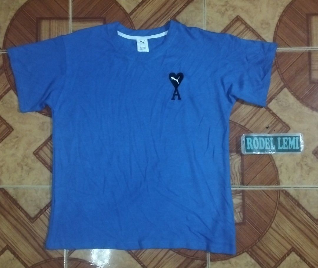Puma x ami (Category: Tshirts & Polo Shirts ) located in Bulacan. Submitted by ryldeal030912 (Listing ID 1464689846, Image 1). Description: excellent condition medium 20" width 27" lenght.