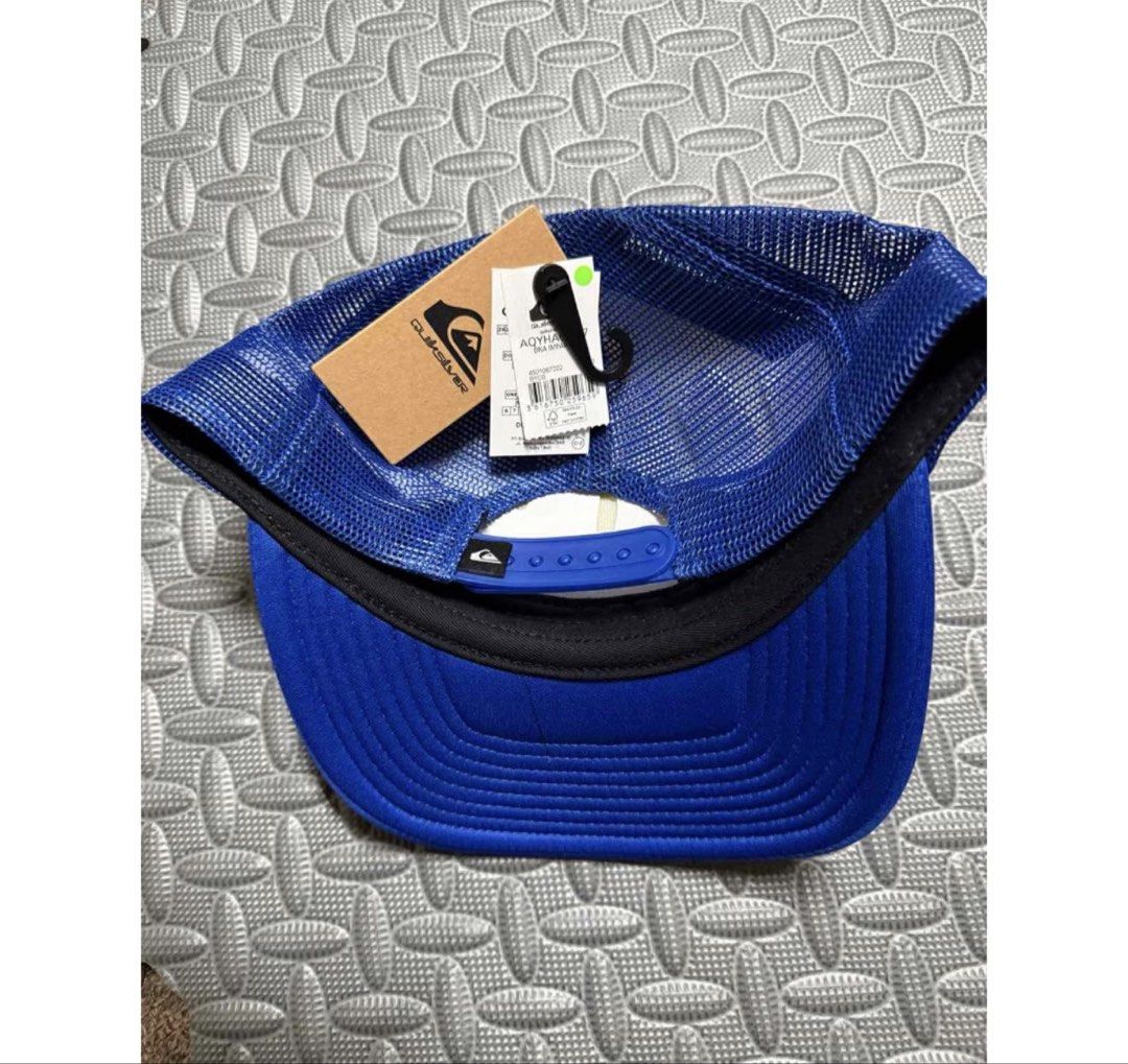 Quiksilver Blue White Trucker Cap (Category: Caps & Hats) located in Manila. Submitted by jpm317 (Listing ID 1464633912, Image 3). Description: - original bought overseas Quiksilver trucker cap in blue and white. - Features a breathable mesh back for comfort. - Adjustable strap for a customized fit. - Size: 58cm. - Brand new with original tags attached. - Made in China..