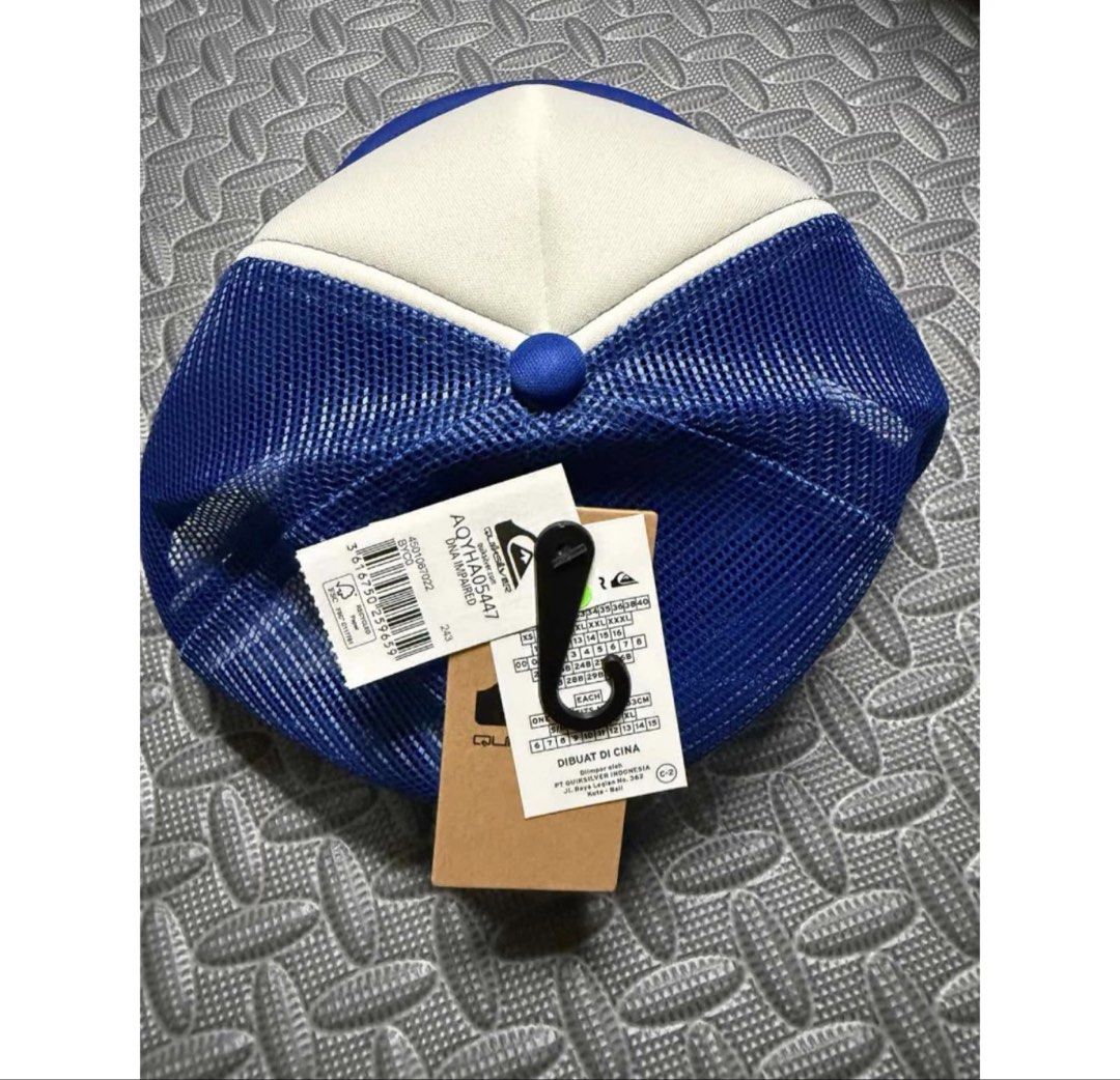 Quiksilver Blue White Trucker Cap (Category: Caps & Hats) located in Manila. Submitted by jpm317 (Listing ID 1464633912, Image 2). Description: - original bought overseas Quiksilver trucker cap in blue and white. - Features a breathable mesh back for comfort. - Adjustable strap for a customized fit. - Size: 58cm. - Brand new with original tags attached. - Made in China..