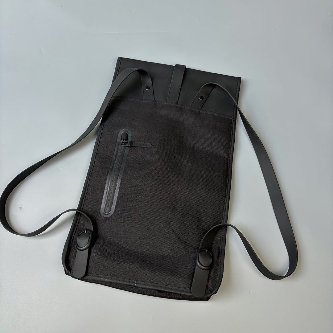 Rains Drip Drip Drip Backpack Black Waterproof (Category: Backpacks) located in Magalang. Submitted by luxgood18 (Listing ID 1464701187, Image 2). Description: Rains Drip Drip Drip Backpack Black Waterproof Issue last pic galing sa USA balik bayan box ewan ko saan sumabit pero brandnew yong bag Brandnew Backpack is clean and ever-contemporary. Silhouette is characterized by its squared shape and flap with magnet snap fastenings. This rucksack fea
