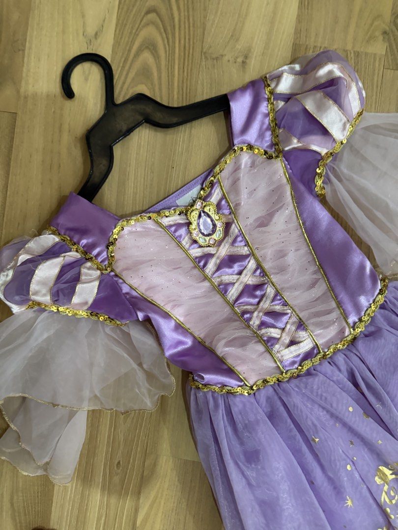 Rapunzel Costume (Category: Babies & Kids Fashion) located in Las Pinas. Submitted by lmpdl (Listing ID 1464658988, Image 2). Description: -Original Rapunzel dress bought from Disneyland - Size 4 on tag but still fits 5-6 -Used once .