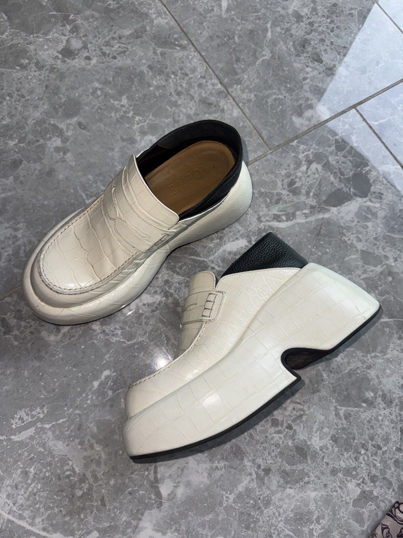 Rare find: Loewe White Croc Embossed Platform Loafers (Category: Loafers) located in Pasig City. Submitted by jesych (Listing ID 1464653438, Image 1). Description: - Loewe white croc embossed platform loafers ——Got it when I was in Paris - Chunky sole with unique cut-out heel - Easy slip-on style - Super comfortable - Adds a cool edge to any outfit - Versatile for dressing up or down.
