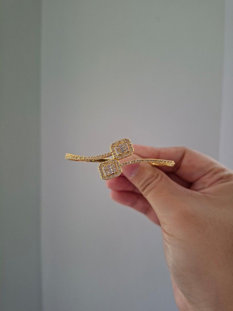 Rectangular Cut Zirconia Stones Twin Pendants Gold Bangle Bracelet (Category: Bracelets) located in Dasmarinas. Submitted by danabrie22 (Listing ID 1464623252, Image 1). Description: very well-made, excellent crafstmanship 10/10 condition brand new stainless steel & white crystal-colored cubic zirconia stones made in Hongkong.