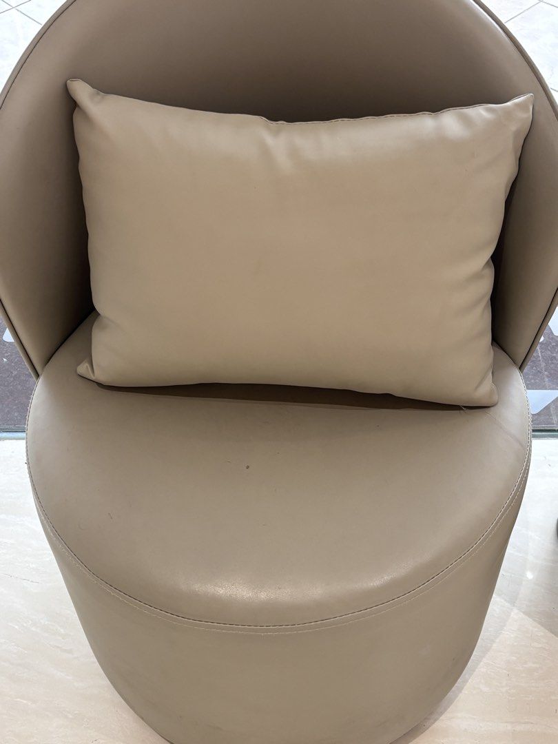 Rectangular Throw Pillow (Category: Chairs) located in Singapore. Submitted by homeresetsg (Listing ID 1464736039, Image 1). Description: - Material: Smooth beige faux leather - Versatility: Compact size ideal to support your back - Design: Neutral tone that easily matches any room decor - Available 2pcs.