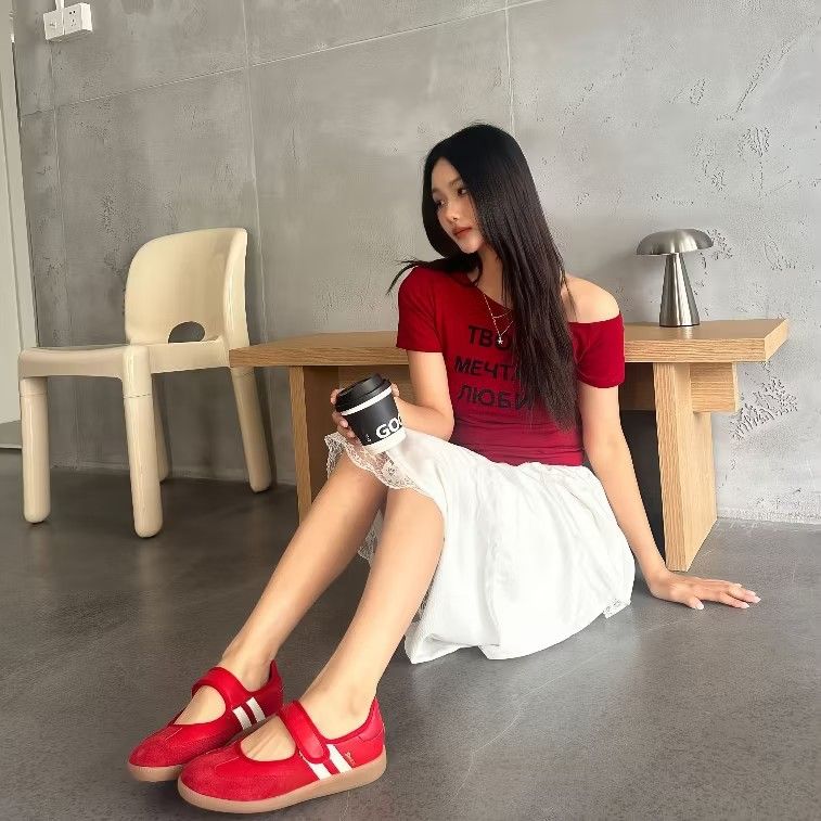 Red Mary Jane Sneakers with White Stripes (Category: Sneakers) located in Manila. Submitted by pauwie40838 (Listing ID 1464687588, Image 1). Description: - Style: Bright red Mary Jane sneakers with sporty white side stripes - Closure: Easy velcro strap across the top for quick wear - Sole: Flat brown rubber sole with great grip - Versatility: Comfortable fit, easy to match with both skirts and jeans.