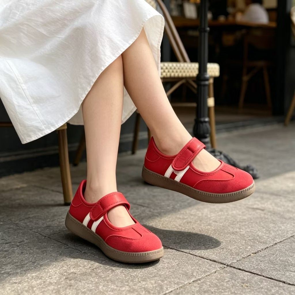 Red Mary Jane Sneakers with White Stripes (Category: Sneakers) located in Manila. Submitted by pauwie40838 (Listing ID 1464687588, Image 3). Description: - Style: Bright red Mary Jane sneakers with sporty white side stripes - Closure: Easy velcro strap across the top for quick wear - Sole: Flat brown rubber sole with great grip - Versatility: Comfortable fit, easy to match with both skirts and jeans.