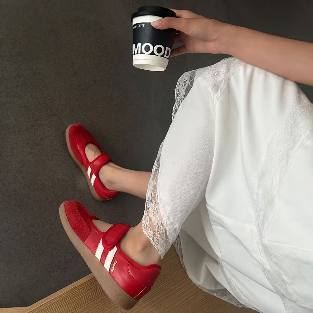 Red Mary Jane Sneakers with White Stripes (Category: Sneakers) located in Manila. Submitted by pauwie40838 (Listing ID 1464687588, Image 2). Description: - Style: Bright red Mary Jane sneakers with sporty white side stripes - Closure: Easy velcro strap across the top for quick wear - Sole: Flat brown rubber sole with great grip - Versatility: Comfortable fit, easy to match with both skirts and jeans.