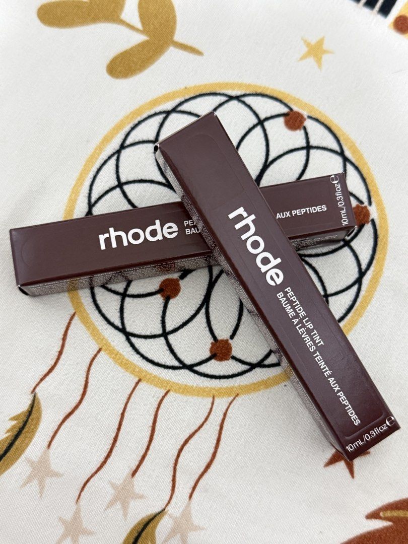 Rhode Peptide Lip Tint (Category: Makeup) located in Pasay City. Submitted by jhnxvii (Listing ID 1464700254, Image 3). Description: US-BOUGHT 🇺🇸 & AUTHENTIC Rhode Peptide Lip Tints are here!!! 💅💖 All are brand new, sealed, and never opened — fresh out of the beauty vault 💋🔐 🎀 AVAILABLE SHADES: 🍞 Toast — 2 pcs ☕ Espresso — 2 pcs 🎀 Ribbon — 2 pcs 🍓 Raspberry Jelly — 1 pc Come get your little Rhode moment before they’re GONE, GONE, GONE!!