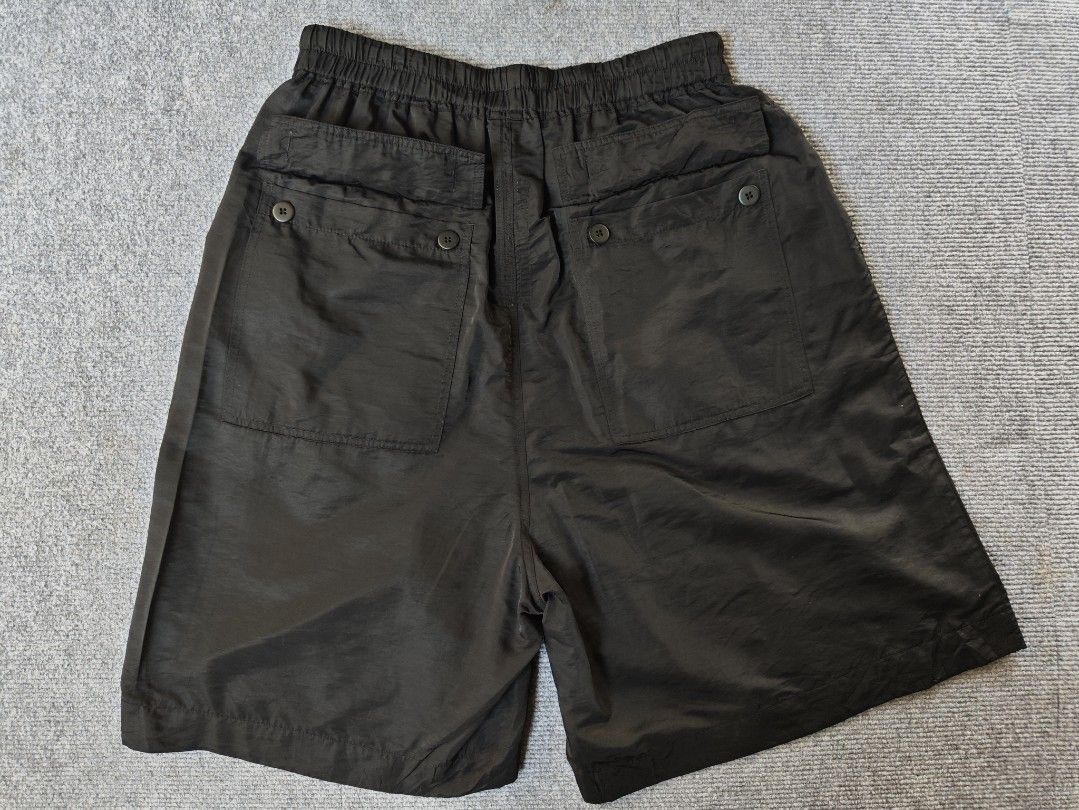 Rick Owens Short (Category: Shorts) located in Midsayap. Submitted by indigoventure (Listing ID 1464655718, Image 2). Description: Free size Waistline: 30 to 36 Length: 23.5 RICK OWENS Lido Boxer Shorts Lido Boxer shorts with signature drawstring waistband. . Mid rise . Drawstring waistband • Side slip pockets • Rear patch pockets · Made in Italy • 100% Cupro. Dry clean • Color: Black • Code: RP01D2320J 09.