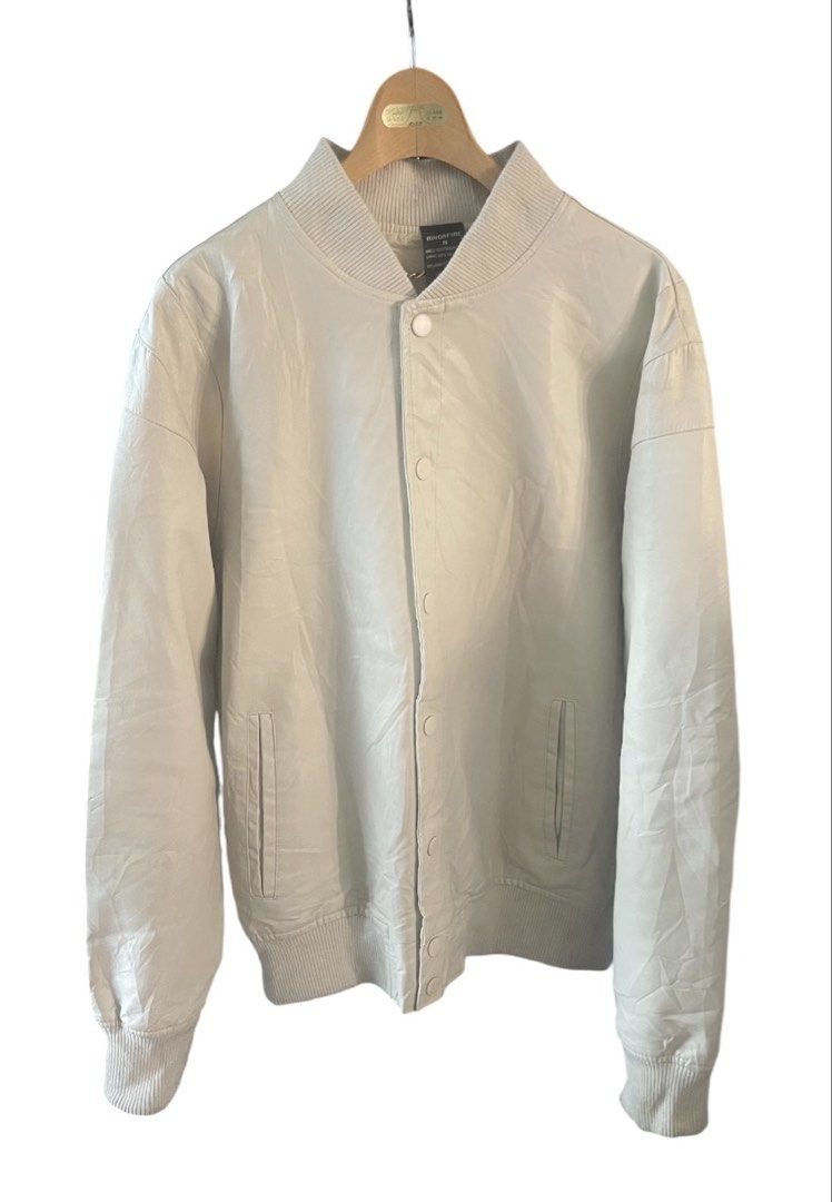 Ring Of Fire Leather Varsity Birch -colored bomber jacket (Category: Coats, Jackets and Outerwear) located in San Pedro. Submitted by lifebeginsaftercoff33 (Listing ID 1464589216, Image 3). Description: - Jonah Vegan Leather Varsity Birch -colored bomber jacket from Ring Of Fire - Can be unisex - Snap button front closure - Ribbed collar, cuffs, and hem for a snug fit - Two convenient side pockets - Fully lined interior with a stylish chain detai