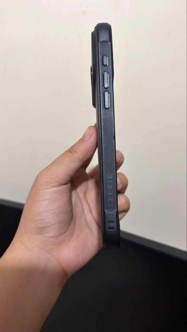 Ringke Onyx Phone Case for iPhone 17 Pro Max (Category: Cases & Sleeves) located in Taguig. Submitted by cessymeme (Listing ID 1464589564, Image 2). Description: - Brand: Ringke - Model: Onyx - Compatible with: iPhone 17 Pro Max - Color: Black - Features: Durable protection, slim design - Condition: Used, with minor scratches on the back.