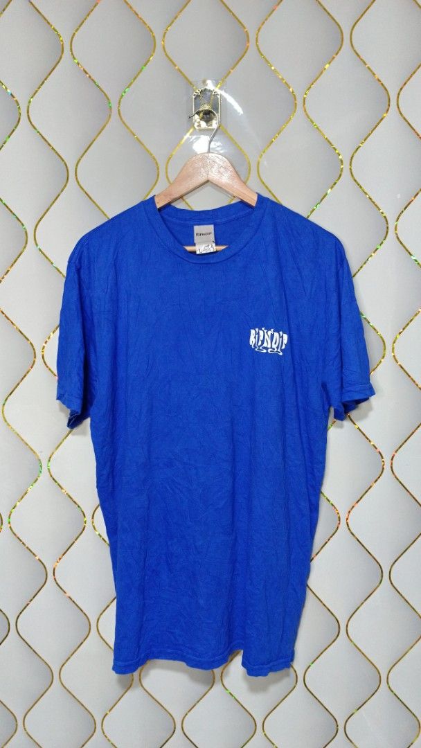 RIPNDIP Blue Graphic T-shirt (Category: Tshirts & Polo Shirts ) located in Manila. Submitted by zariyah.1986 (Listing ID 1464756143, Image 1). Description: Bright blue RIPNDIP tee with a small logo hit on the front chest. Back has a large graphic of the white cat surrounded by flames and green leaves. Standard crewneck and short sleeves. Tag says size Large, measures approximately 21 inches pit to pit by 29 inches length. Cotton fabric, soft feel