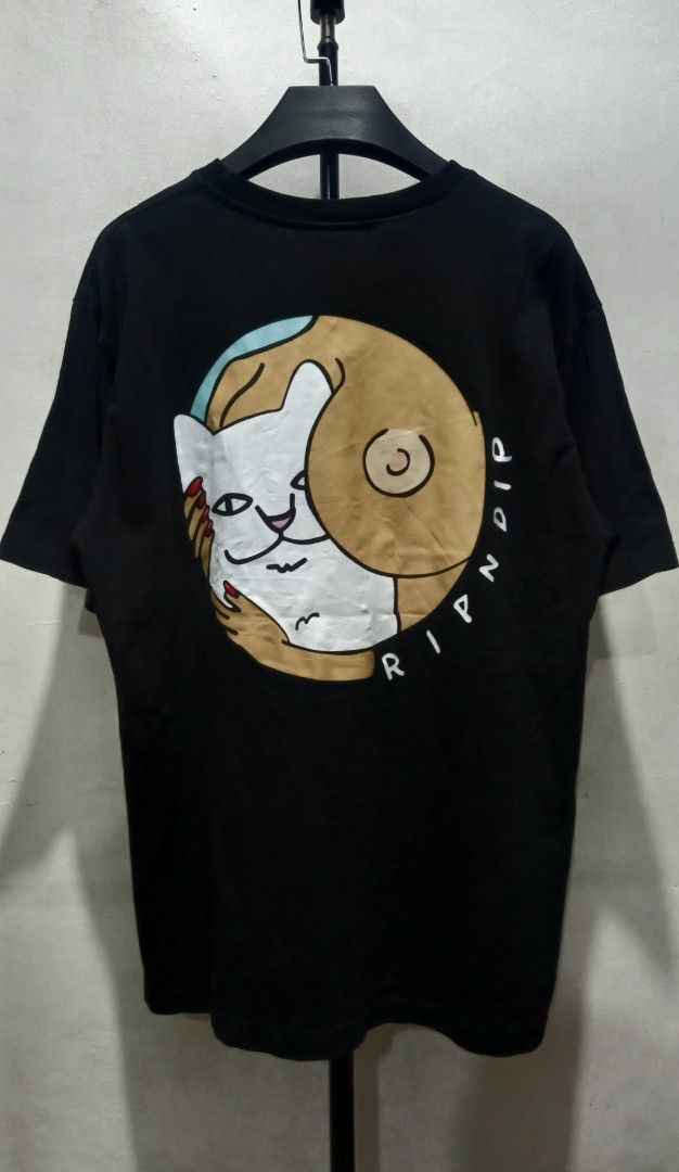 RIPNDIP "Must Be Nice" Graphic T-Shirt (Category: Shirts) located in Tarlac. Submitted by den420 (Listing ID 1464657456, Image 2). Description: - Brand: RIPNDIP - Design: 'Must Be Nice' text on front, iconic RIPNDIP cat graphic on back - Material: 100% Cotton - Size: Tagged Small - Style: Casual wear.