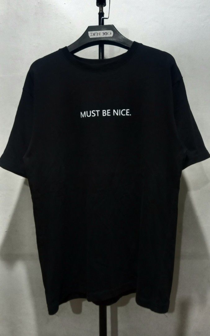 RIPNDIP "Must Be Nice" Graphic T-Shirt (Category: Shirts) located in Tarlac. Submitted by den420 (Listing ID 1464657456, Image 1). Description: - Brand: RIPNDIP - Design: 'Must Be Nice' text on front, iconic RIPNDIP cat graphic on back - Material: 100% Cotton - Size: Tagged Small - Style: Casual wear.