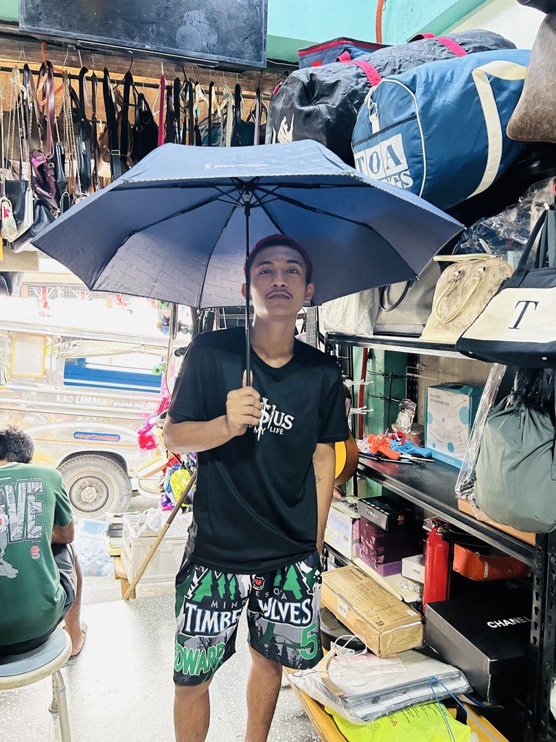 Roberta di Camerino Navy Blue Umbrella (Category: Umbrellas) located in Manila. Submitted by starbalesukandjapansurplus (Listing ID 1464585273, Image 1). Description: - Authentic Roberta di Camerino navy blue umbrella - Features the iconic signature logo pattern all over the canopy - Compact and foldable design for convenient storage - Elegant gold accent on the handle - Essential accessory for rainy weather.