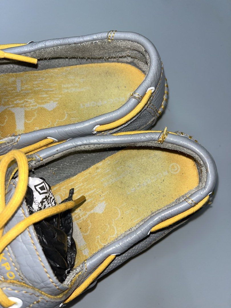 ROCKSPORT TOP SIDER (Category: Casual Shoes) located in Lala. Submitted by adrian.885 (Listing ID 1464688961, Image 3). Description: ROCKSPORT TOP SIDER gray perforated leather boat shoes feature striking yellow laces and contrast welts from Rockport..
