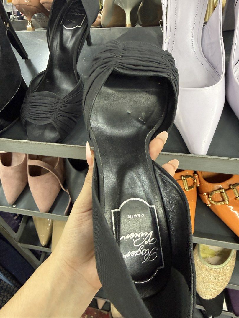 Roger Vivier Paris Black Ruched Heels Size 38 (Category: Heels) located in Manila. Submitted by fastlion.584bdf (Listing ID 1464738034, Image 2). Description: - Brand: Roger Vivier Paris - Size: 38 (Made in Italy) - Color: Classic Black - Style: Slim heel with elegant ruched fabric across the front toe area - Condition: Soles show previous use, interior branding is clearly printed and intact - Versatility: Timeless design that pairs effortlessly 
