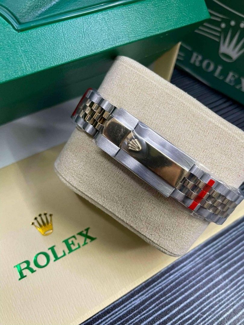 Rolex Datejust Wimbledon Dial (Category: Luxury Watches) located in Manila. Submitted by 2bleup_ (Listing ID 1464709953, Image 2). Description: SPECS: - Size: 36mm - Perfect for everyday wrist - Movement: Automatic - No Battery Needed, winds automatically when worn - Glass: Mineral Glass with Cyclops Date Magnifier at 3 o'clock - Bezel: Fluted Bezel - Bracelet: Jubilee Bracelet (Two-Tone & Full Silver Stainless) - Material: Premium Stainless Stee
