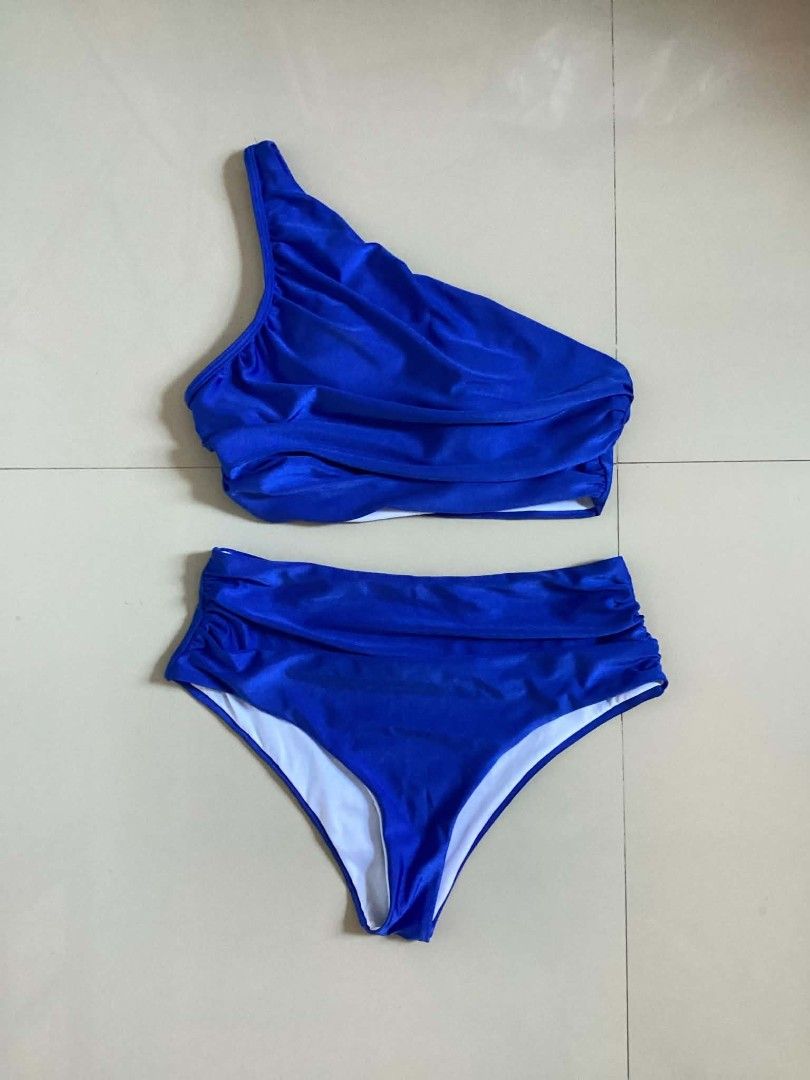 Royal Blue One-Shoulder Ruched High-Waisted Bikini (Category: Bikinis & Swimsuits) located in Siniloan. Submitted by mari_881709 (Listing ID 1464617732, Image 1). Description: - Super cute royal blue bikini set - One-shoulder top with ruched detailing - High-waisted bottoms with ruching - Shiny fabric - Vibrant, eye-catching color - Ideal for beach or pool days.