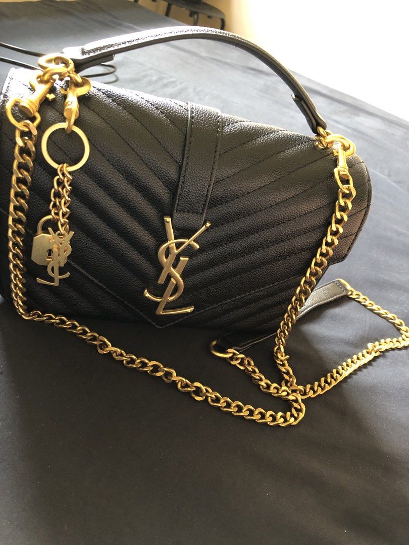 Saint Laurent Black Chevron Leather Chain Bag (Category: Luxury Bags & Wallets) located in Mandaluyong City. Submitted by ginasky89 (Listing ID 1464591354, Image 1). Description: -(YSL) Crossbody Bag - Iconic Chevron Quilting - Elegant Gold Hardware - Detachable Chain Strap - Cute Lock and Key Charm Included - Comes with Original Saint Laurent Paris Box - Versatile for Day or Night Use.