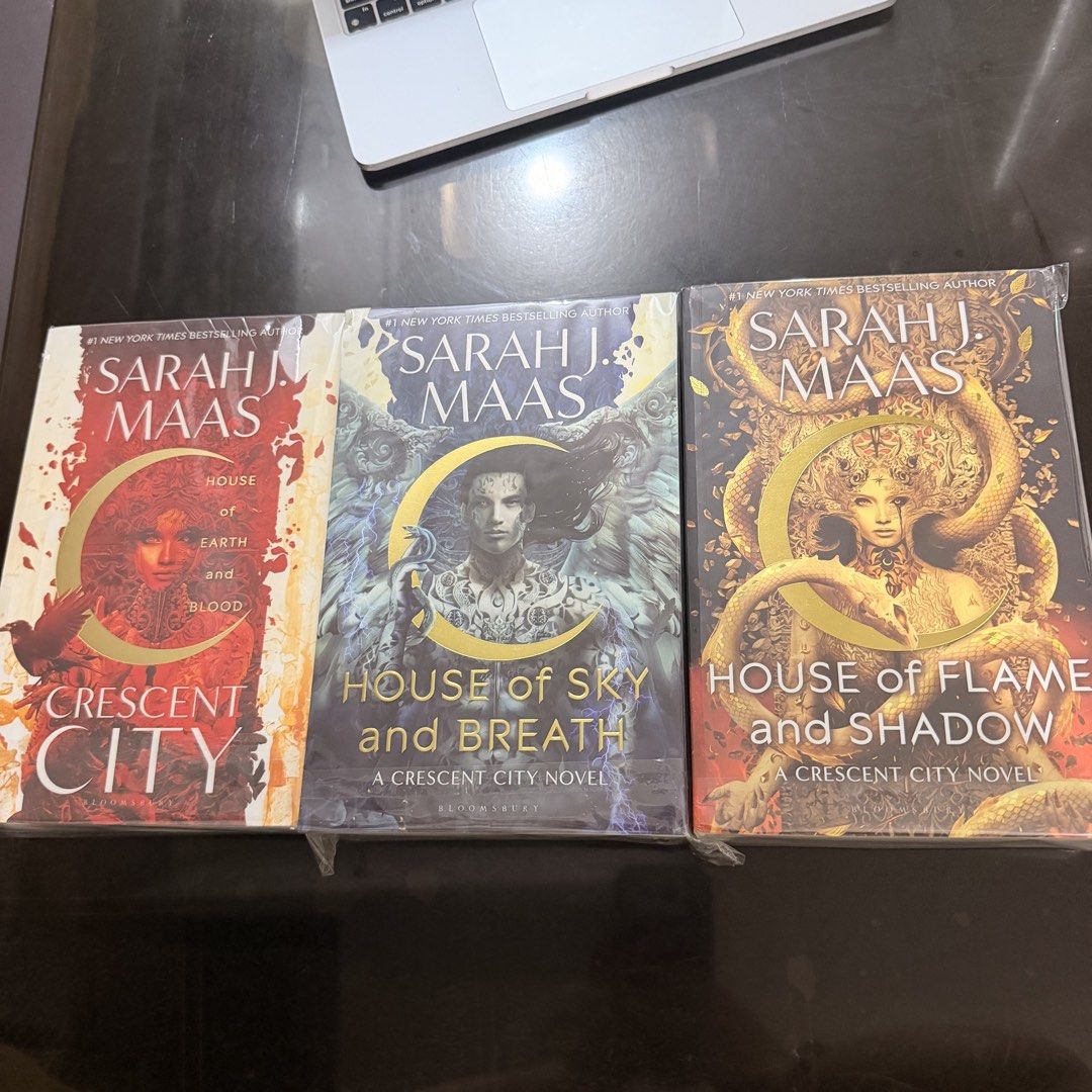 Sarah J. Maas Crescent City Trilogy Set (Category: Storybooks) located in Manila. Submitted by songcotrisha (Listing ID 1464735294, Image 2). Description: - Brand New Complete 3-book Crescent City trilogy by Sarah J. Maas - Includes House of Earth and Blood, House of Sky and Breath, and House of Flame and Shadow - Paperback editions - Wrapped in protective plastic for safekeeping - Perfect for book lovers and collectors - Never been read - No iss