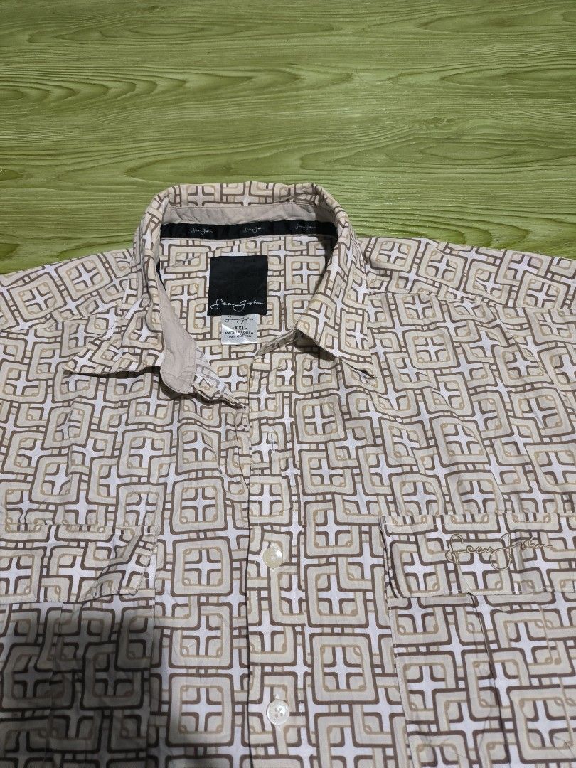 Sean John Y2K Button Down Polo (Category: Tshirts & Polo Shirts ) located in Manila. Submitted by _hayashiguntaru (Listing ID 1464694804, Image 2). Description: Excellent Condition No Issue Size: 2XL Dimes: 27x32.