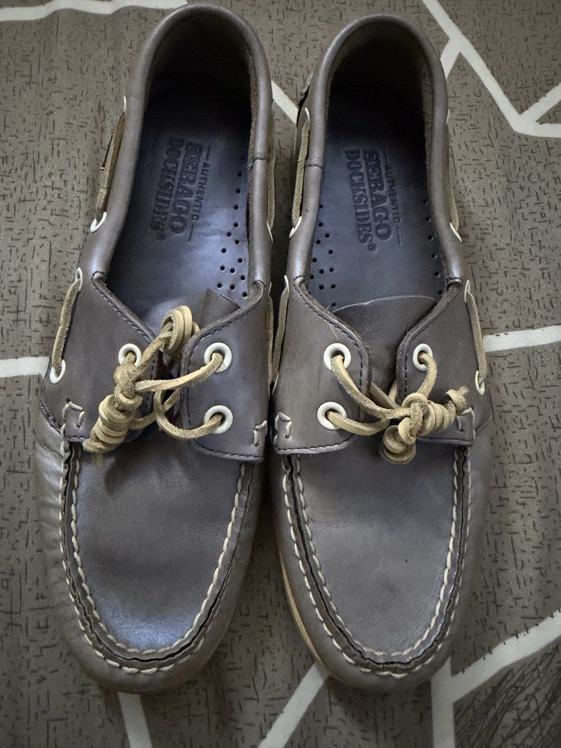 Sebago Docksides Authentic Leather Boat Shoes (Category: Loafers) located in Tarlac. Submitted by ney14 (Listing ID 1464653663, Image 1). Description: - Authentic Sebago Docksides boat shoes - Genuine leather in a greyish-brown color - Perfect for casual wear - Soles show some wear but have plenty of grip - Laces are intact - Timeless and versatile style.