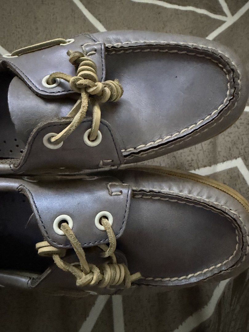 Sebago Docksides Authentic Leather Boat Shoes (Category: Loafers) located in Tarlac. Submitted by ney14 (Listing ID 1464653663, Image 2). Description: - Authentic Sebago Docksides boat shoes - Genuine leather in a greyish-brown color - Perfect for casual wear - Soles show some wear but have plenty of grip - Laces are intact - Timeless and versatile style.