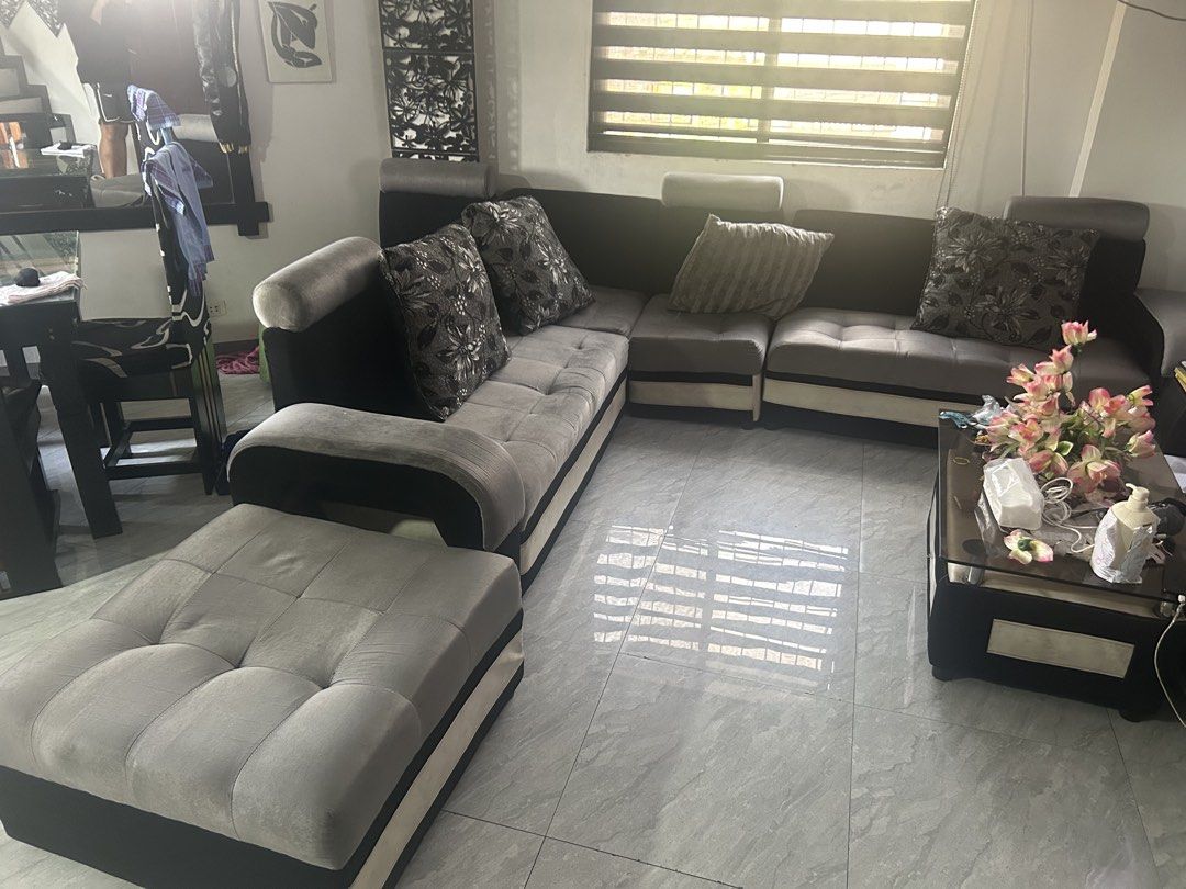 Sectional Sofa with Ottoman and Accent Chair (Category: Sofas) located in Manila. Submitted by colinrosa644114 (Listing ID 1464572863, Image 1). Description: PRICE IS NEGOTIABLE -Comfortable U-shaped sectional sofa with ottoman - Includes a matching accent chair - Upholstered in a stylish grey and black fabric mix - Features tufted seat cushions for added elegance - Comes with decorative throw pillows for a complete look - Ideal for enhancing you