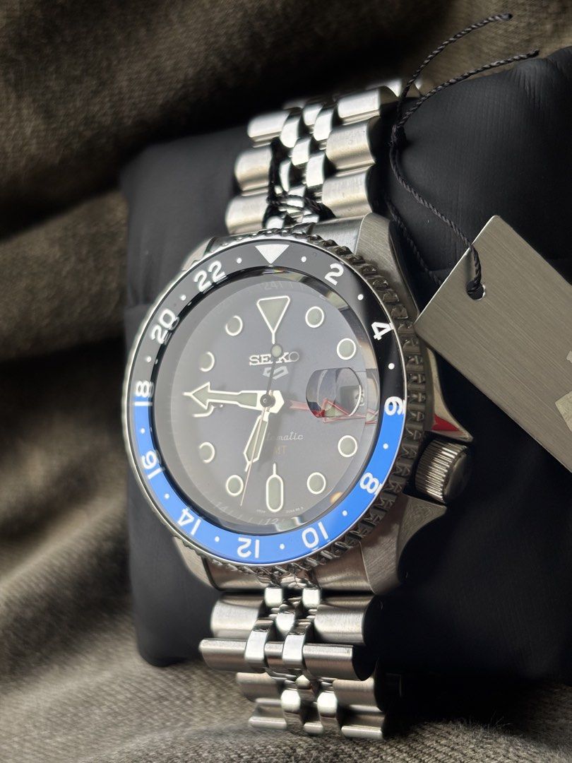 SEIKO 5 GMT “BATMAN” (Category: Men's Watches) located in Manila. Submitted by angelodelgado (Listing ID 1464706305, Image 2). Description: 💰 FOR SALE — ₱21,500 🏷️ SRP — ₱31,500 💸 SAVE — ₱10,000 ✨ Original Seiko ⌚ Iconic Batman Blue & Black Bezel 📌 CONDITION 🆕 Unworn — still in brand new condition ✨ No signs of usage 💎 Clean case, dial & bracelet ⏱️ Ready to wear 📦 COMPLETE INCLUSIONS ✅ Seiko Watch ✅ Original Seiko Box ✅ Seiko Manual/Bookl