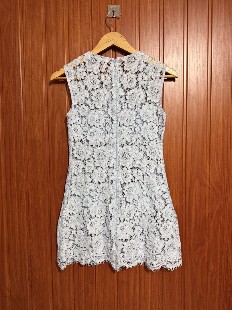Self-Portrait Blue Fine Lace Mini Dress (Category: Dresses) located in Manila. Submitted by tlfph (Listing ID 1464708486, Image 3). Description: - Brand: Self-Portrait - Color: Classic Blue - Material: Fully patterned fine lace construction - Design: Sleeveless with front pockets, button-style placket, and scalloped hem - Closure: Convenient back neck zipper - Length: Mini / classic silhouette - Condition: Excellent, buyer-friendly deal!.