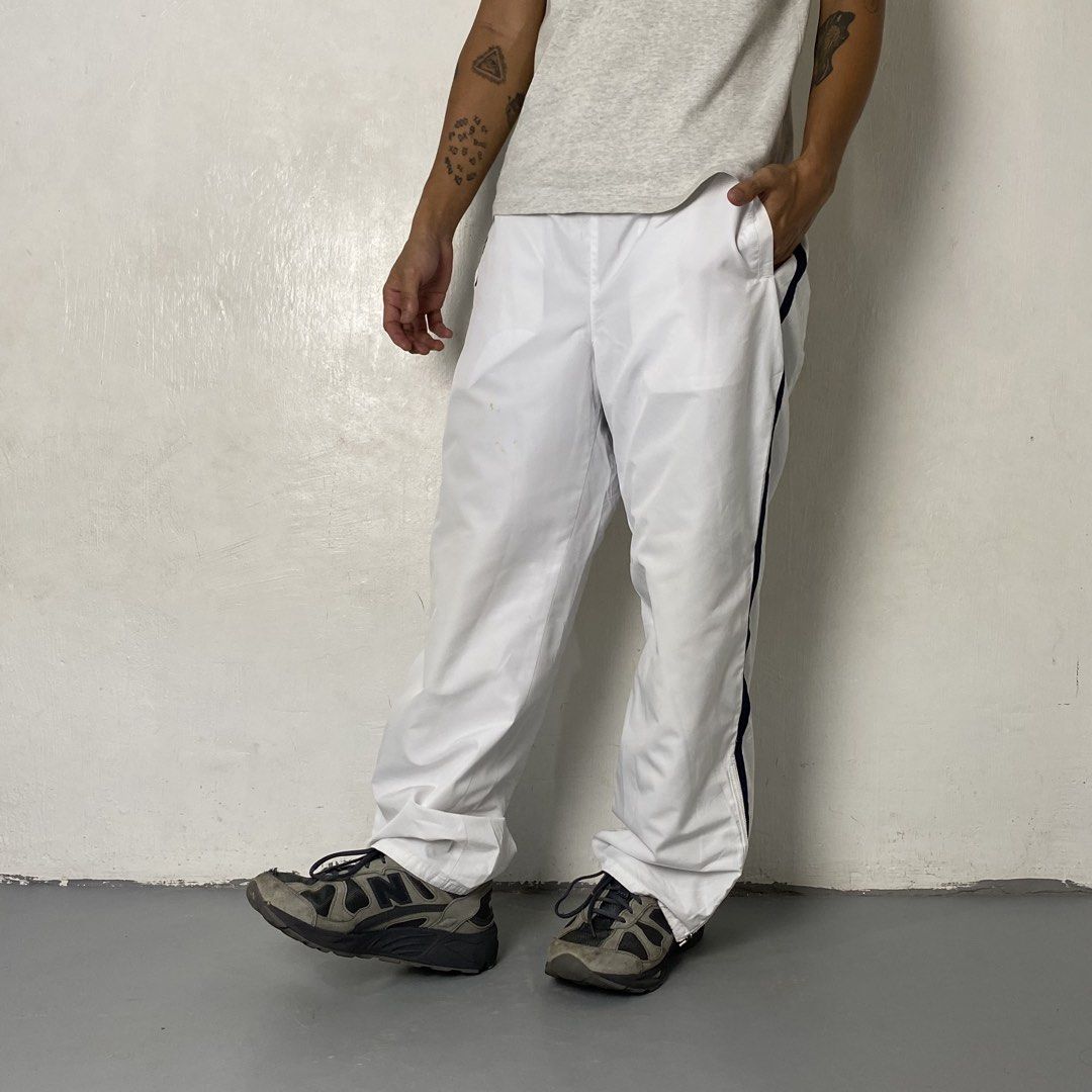SergioTacchini 👟| White Baggy Track Pants (Category: Trousers) located in Bulacan. Submitted by orc.ph (Listing ID 1464691070, Image 3). Description: SergioTacchini 👟| White Baggy Track Pants Material Used: 100% Polyester -Straight-Leg -Baggy Silhouette -Adjustable Internal Drawchord -Gathered Waistband -Ankle Side Zippers -Side Slip Pockets -Casual -Active Wear -Size: M -Waistline: “32 -Length: “38 -Thighs: “13 -Leg Opening: “9.5 -Rise: “12.5 