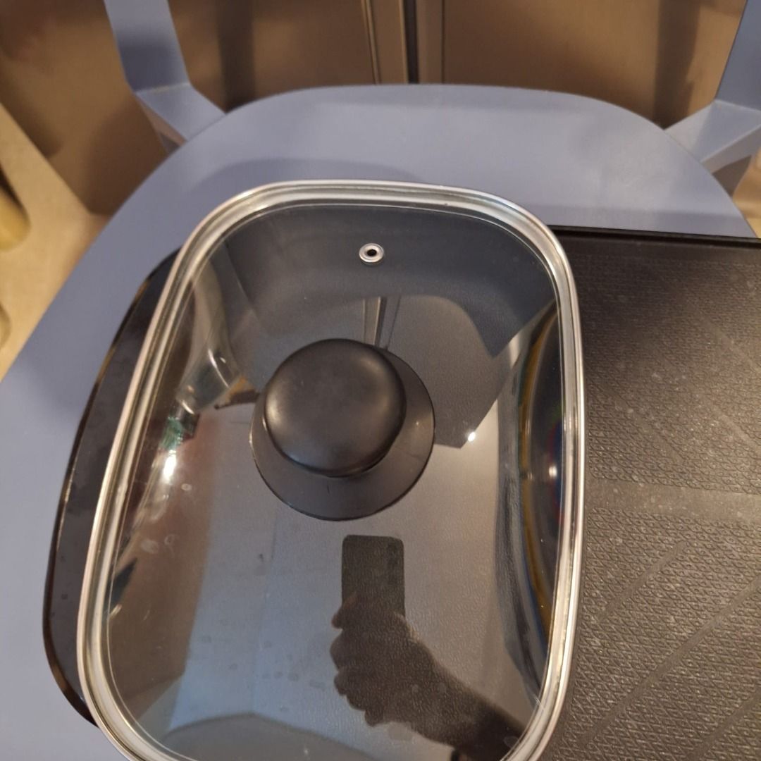 SHABU SHABU Multi Cooker (Category: Bathroom & Kitchen Fixtures) located in General Trias. Submitted by aeunice (Listing ID 1464766415, Image 2). Description: 220v. Multi-Functional Rinse One Pot, With Tempered glass lid, Non-Stick Pan, Easy To Clean, High Power Heating, Black. Complete Inclusion. In Good running condition. Enjoy grilling and shabu-shabu at the same time. Fast Heating Efficient, Powerful, Evenly Heating. Safe Non-Stick Grill Pan: