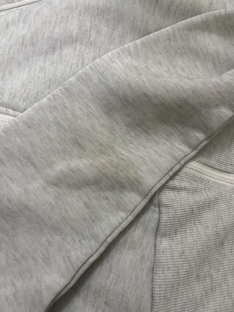 Shein Light Grey Zip-Up Cropped Hoodie (Category: Coats, Jackets and Outerwear) located in Makati City. Submitted by samsafsav (Listing ID 1464608264, Image 3). Description: Fits XS to S Has stains on the elbow and wrist areas of the sleeve RFS: Decluttering.