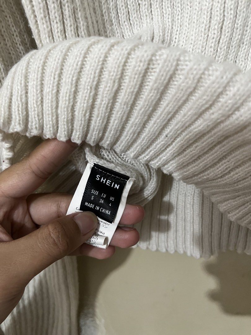 SHEIN White Turtleneck Ribbed Sweater Size S (Category: Longsleeves) located in Manila. Submitted by outtacloset (Listing ID 1464713809, Image 3). Description: - Brand: SHEIN - Color: White - Size: S (US 4, EU 36) - Material: Thick knit - Features: Ribbed turtleneck, long sleeves with fitted cuffs - Condition: Great staple piece for cooler weather - Origin: Made in China.